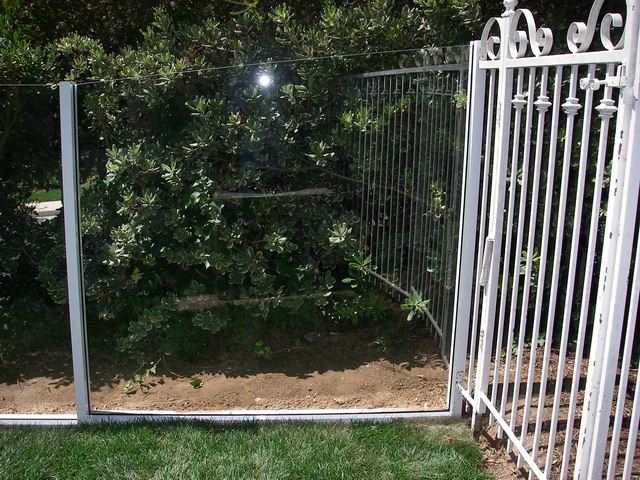 Glass Fence into Dirt